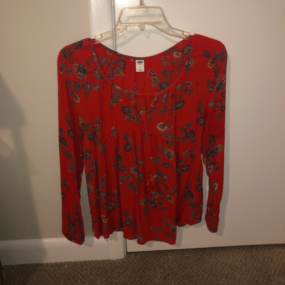 red flowery blouse. loose sleeves & comfortable